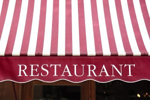 restaurant awing sign by covenant signs and graphics